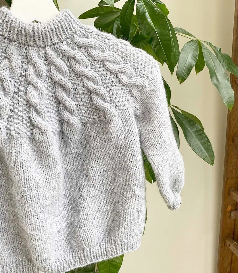 Perletwistminisweater - dansk